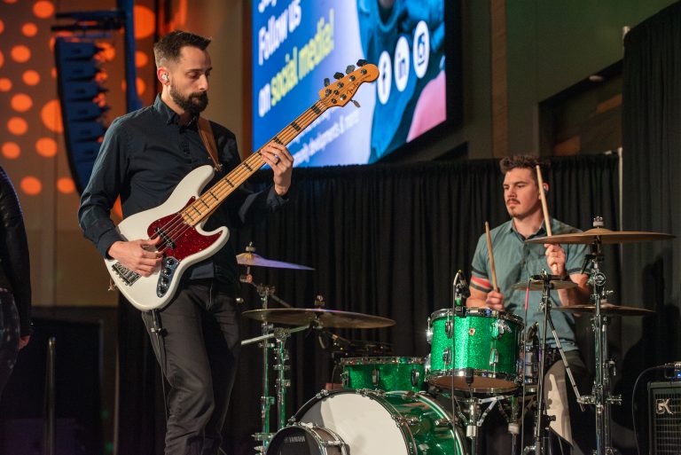 Live music performance at the 2024 GFW Inc. Holiday Night