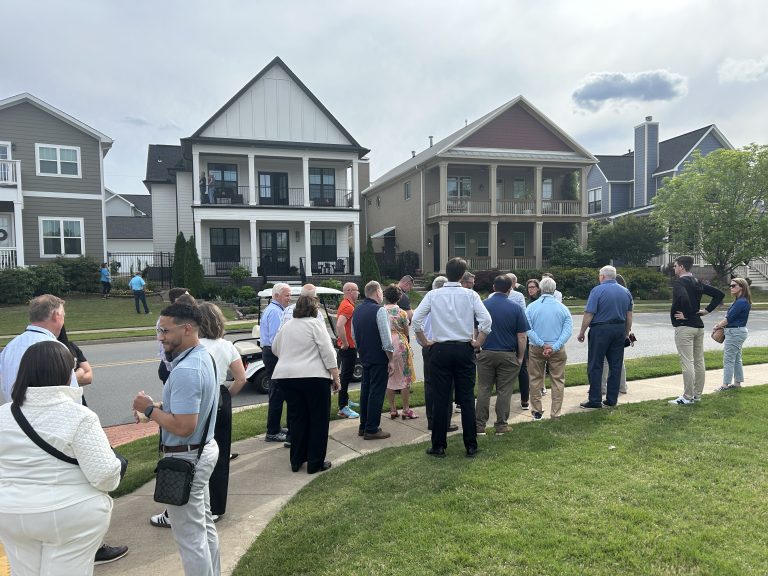 2025 GFW Inc. Inter-City Visit Attendees touring Rockwater Village in Little Rock, AR