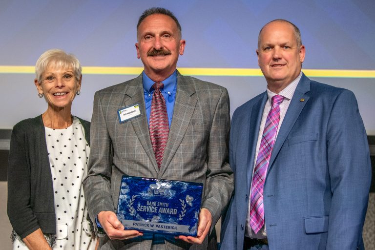 Pat Pasterick receiving the 2025 Barb Smith Service Award at the 2025 GFW Inc. Annual Meeting