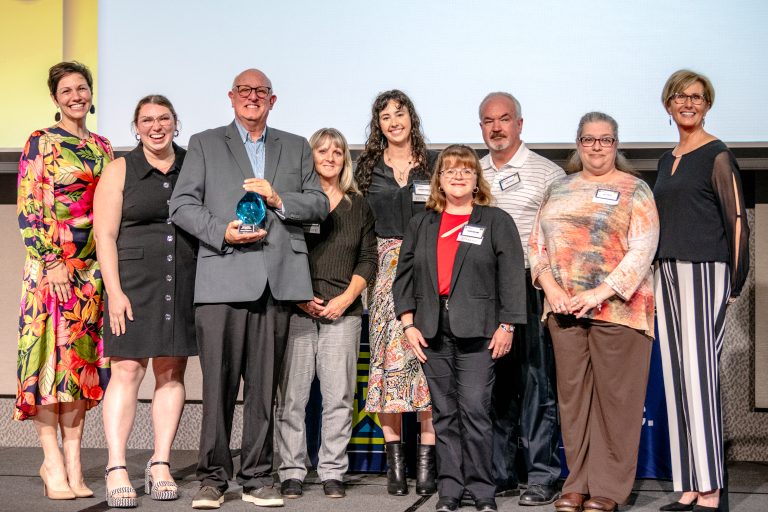 McIntosh Energy receiving the GFW Inc. 2025 Excellence in Small Business Award