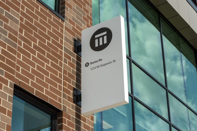 Street signage for Swiss Re Insurance in Downtown Fort Wayne